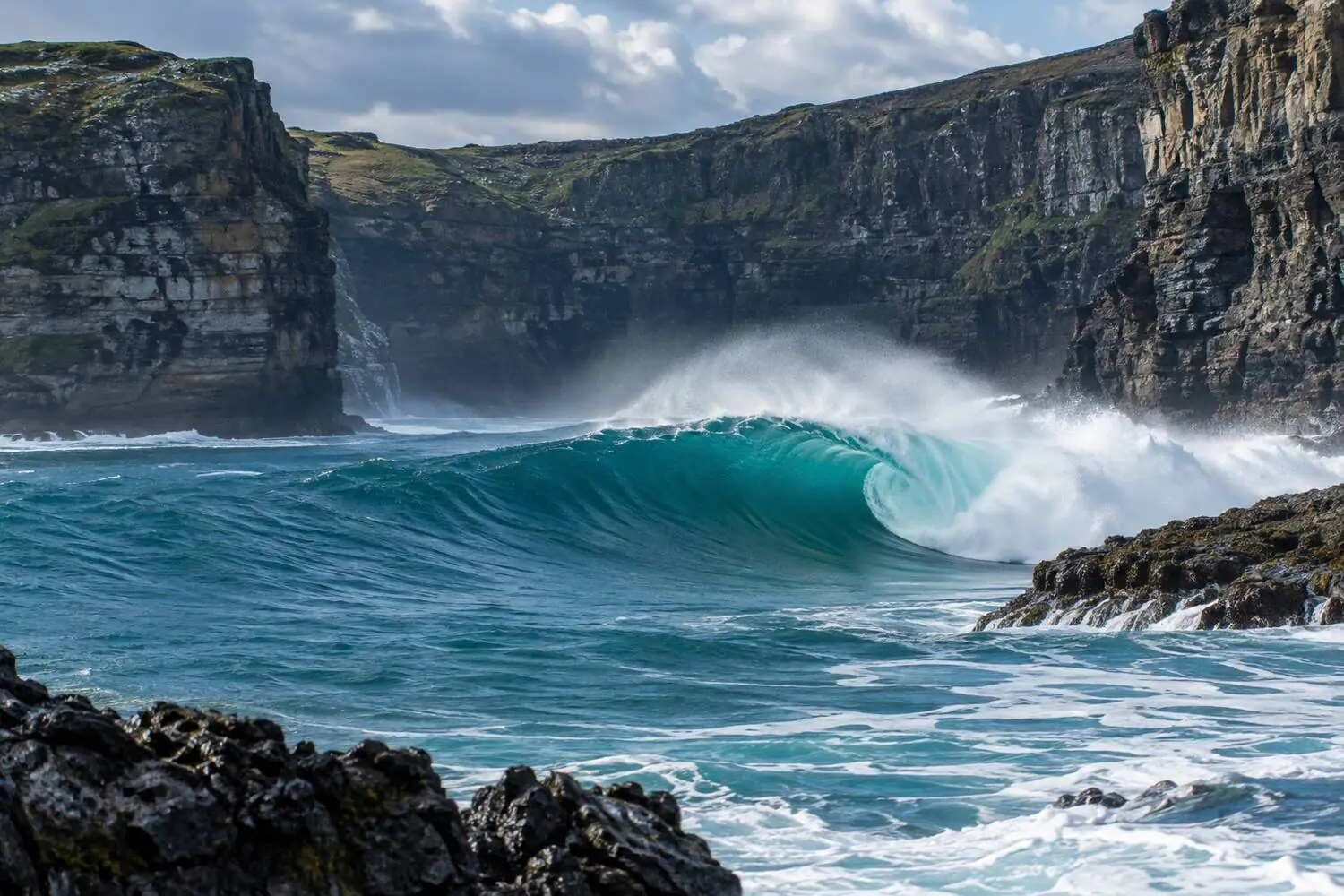 The right-hand reef point peeling into the Bells Beach bowl in Victoria